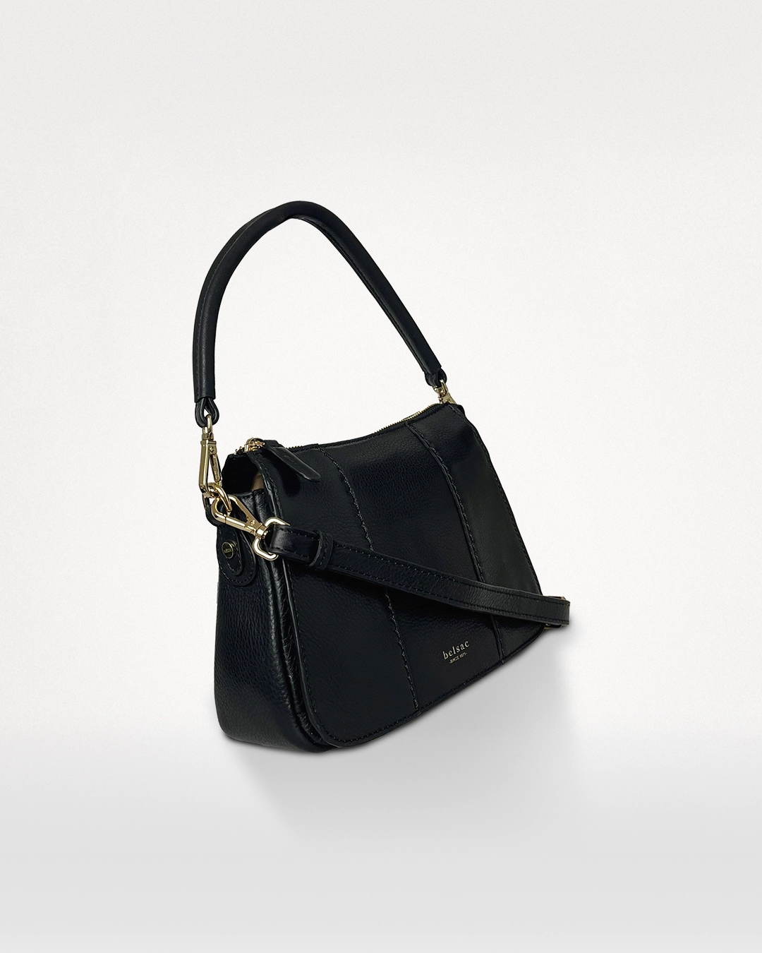 Philipa taske i sort, sidevisning med kort hank og justerbar lang rem