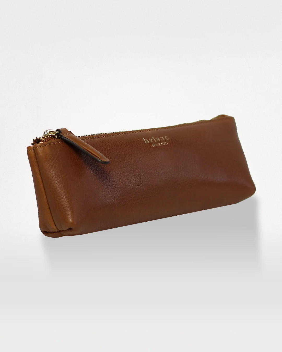 Athena penalhus i cognac læder, fra siden